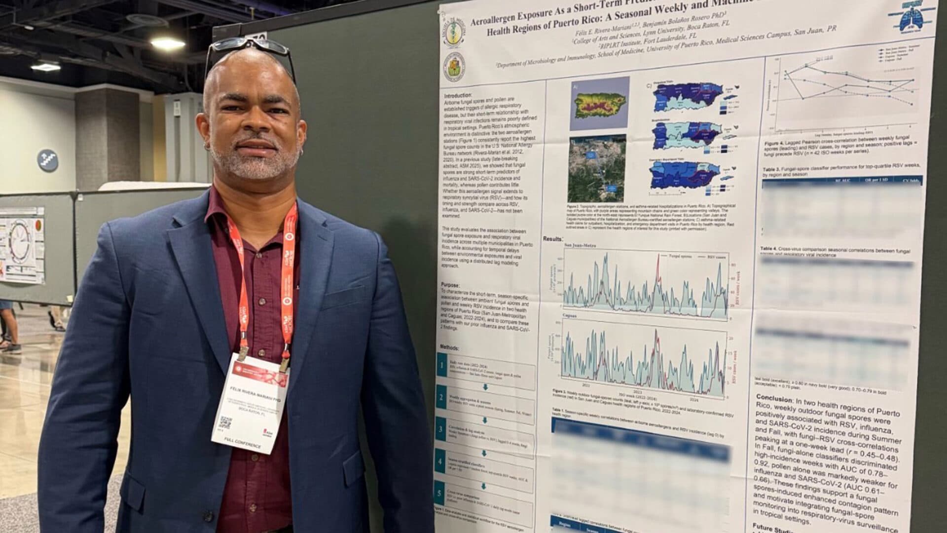 Dr. Félix E. Rivera-Mariani in front of his presentation at ASM Microbe 2026